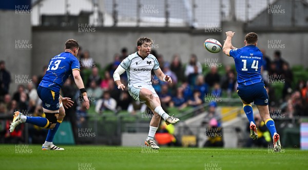 160526 - Leinster v Ospreys - United Rugby Championship - Dan Edwards of Ospreys has a kick charged down by Jordan Larmour of Leinster