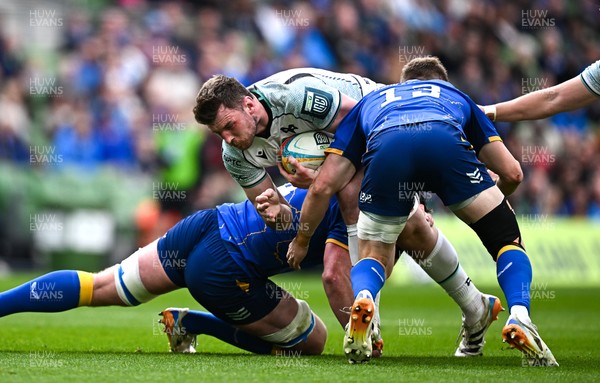160526 - Leinster v Ospreys - United Rugby Championship - James Ratti of Ospreys is tackled by Leinster players Joe McCarthy and Garry Ringrose