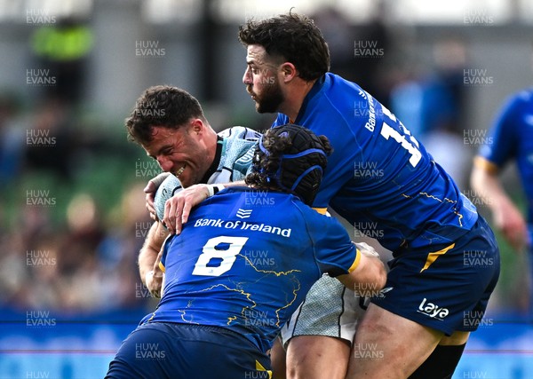 160526 - Leinster v Ospreys - United Rugby Championship - Luke Morgan of Ospreys is tackled by Leinster players James Culhane and Robbie Henshaw
