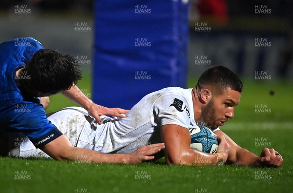 190222 - Leinster v Ospreys - United Rugby Championship - Rhys Webb of Ospreys dives over to score his side's first try
