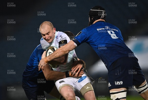 190321 - Leinster v Ospreys - Guinness PRO14 - Luke Price of Ospreys is tackled by Josh Murphy, left, and Scott Fardy of Leinster