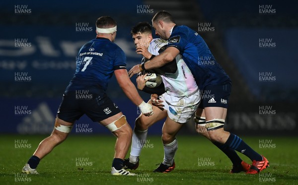 190321 - Leinster v Ospreys - Guinness PRO14 - Joe Hawkins of Ospreys is tackled by Scott Penny and Josh Murphy of Leinster