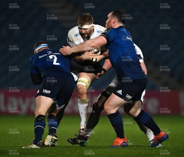190321 - Leinster v Ospreys - Guinness PRO14 - Will Griffiths of Ospreys is tackled by Sean Cronin and Peter Dooley of Leinster