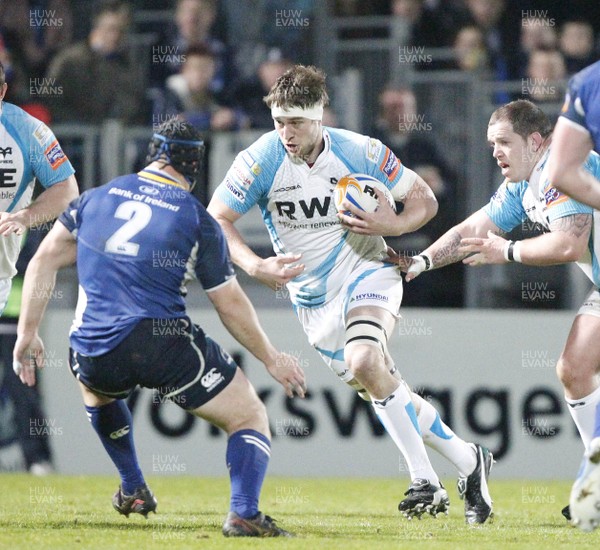 230312 Leinster v Ospreys - RaboDirect Pro 12 - Ospreys' Ryan Jones makes a charge towards Richardt Strauss of Leinster