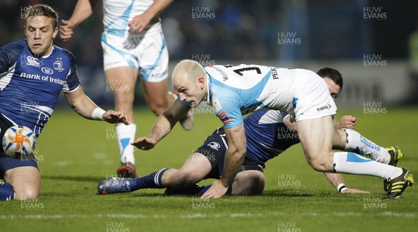 230312 Leinster v Ospreys - RaboDirect Pro 12 - Ospreys' Richard Fussell and Leinster's David Kesrney compete for a loose ball