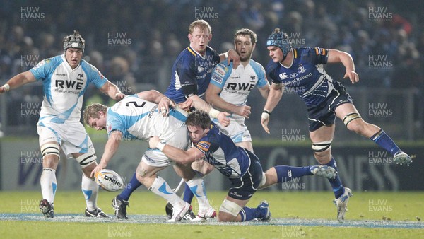 230312 Leinster v Ospreys - RaboDirect Pro 12 - Ospreys' Richard Hibbard is tackled by Dominic Ryan of Leinster