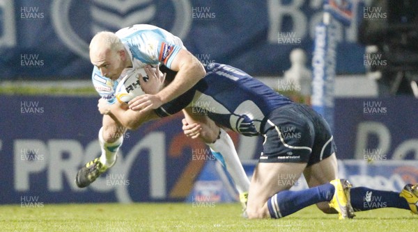 230312 Leinster v Ospreys - RaboDirect Pro 12 - Richard Fussell of Ospreys is tackled by Luke Fitzgerald of Leinster