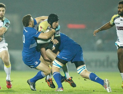 291114 - Leinster v Ospreys - Guinness Pro12 -   Sam Davies of Ospreys is tackled by Jimmy Gopperth and Jordi Murphy of Leinster (c) Huw Evans Agency