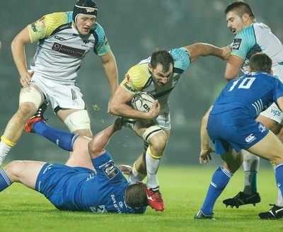 291114 - Leinster v Ospreys - Guinness Pro12 -   Joe Bearman of Ospreys tackled by Tadhg Furlong of Leinster (c) Huw Evans Agency