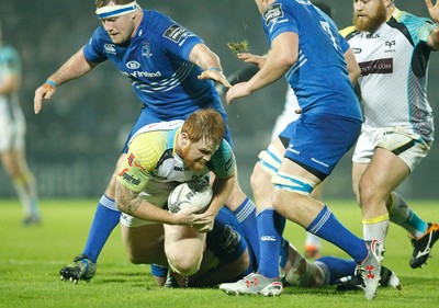 291114 - Leinster v Ospreys - Guinness Pro12 -   Dan Baker of Ospreys is tackled by Tadhg Furlong as Jack Conan and Michael Bent of Leinster support (c) Huw Evans Agency