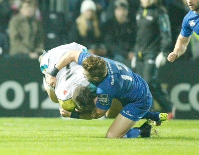 291114 - Leinster v Ospreys - Guinness Pro12 -   Sam Lewis of Ospreys tackled by Ian Madigan of Leinster (c) Huw Evans Agency