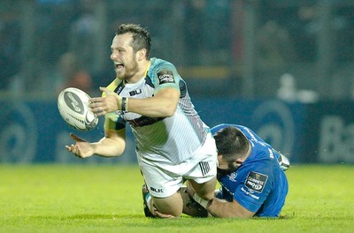 291114 - Leinster v Ospreys - Guinness Pro12 -   Dan Evans of Ospreys tackled by Jamie Hagan of Leinster (c) Huw Evans Agency