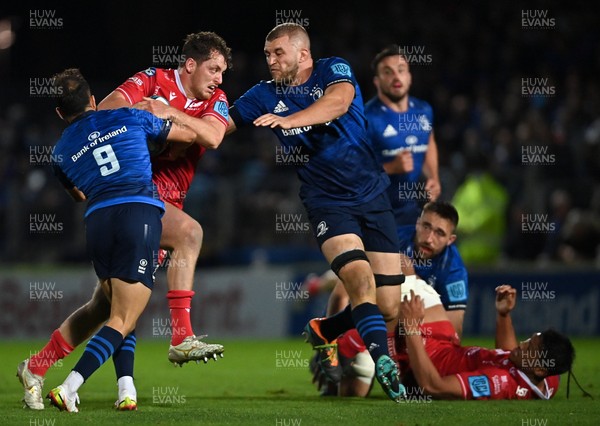 161021 - Leinster v Scarlets - United Rugby Championship - Ryan Elias of Scarlets is tackled by Jamison Gibson-Park of Leinster
