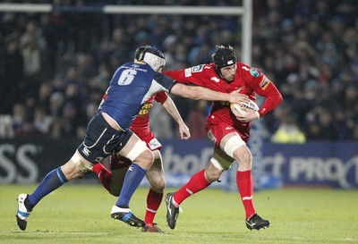 170212 - Leinster v Scarlets - RaboDirect Pro12 -Scarlets' Dominic Day hands off Leinster's Kevin McLaughlin