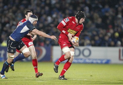 170212 - Leinster v Scarlets - RaboDirect Pro12 -Scarlets' Dominic Day hands off Leinster's Kevin McLaughlin