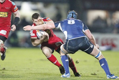 170212 - Leinster v Scarlets - RaboDirect Pro12 -Scarlets' Gareth Davies is tackled by Leinster's Rhys Ruddock