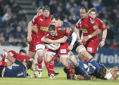 170212 - Leinster v Scarlets - RaboDirect Pro12 -Scarlets' Gareth Maule is tackled by Leinster's Devin Toner