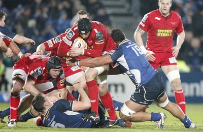 170212 - Leinster v Scarlets - RaboDirect Pro12 -Scarlets' Jonathan Edwards is tackled by Leinster's Leo Auva'a