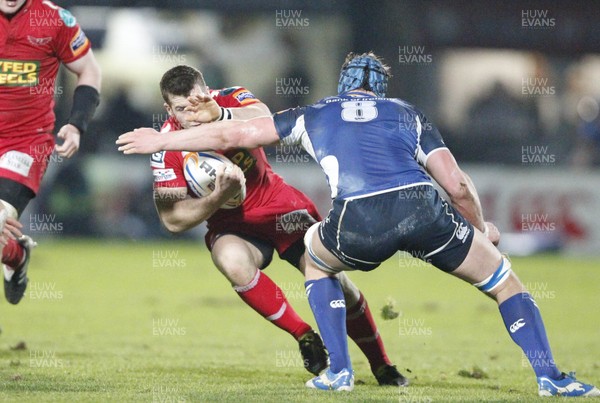 170212 - Leinster v Scarlets - RaboDirect Pro12 -Scarlets' Gareth Davies is tackled by Leinster's Rhys Ruddock