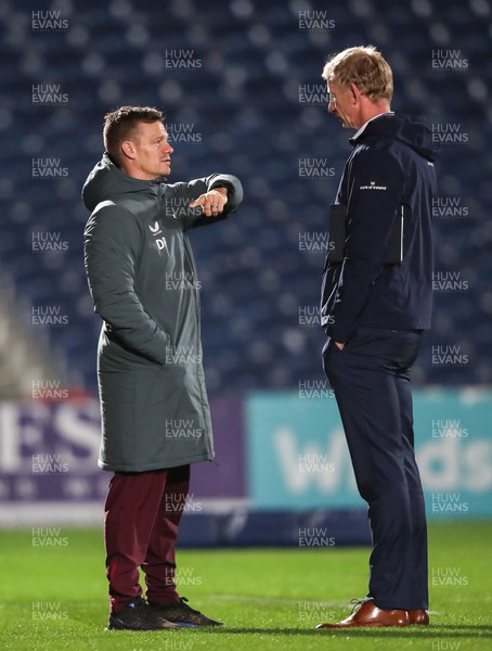 181123 - Leinster v Scarlets - United Rugby Championship - Scarlets head coach Dwayne Peel, left, in conversation with Leinster head coach Leo Cullen