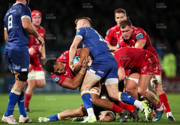 181123 - Leinster v Scarlets - United Rugby Championship - Carwyn Tuipulotu of Scarlets is tackled by Garry Ringrose of Leinster