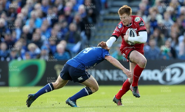 190517 - Leinster v Scarlets - Guinness PRO12 Semi Final - Rhys Patchell of Scarlets is tackled by Luke McGrath of Leinster