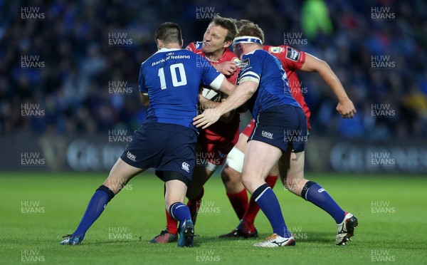 190517 - Leinster v Scarlets - Guinness PRO12 Semi Final - Hadleigh Parkes of Scarlets is tackled by Johnny Sexton and James Tracy of Leinster