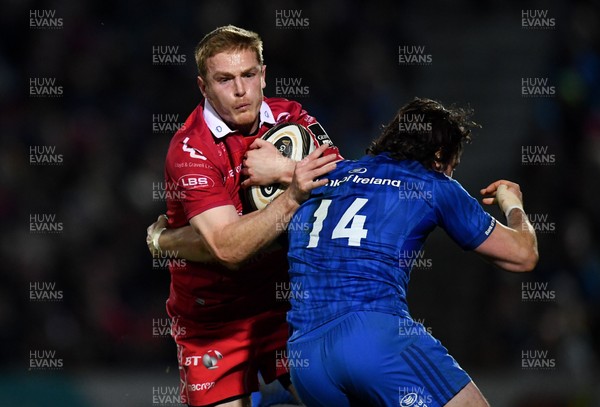 250119 - Leinster v Scarlets - Guinness PRO14 -  Johnny McNicholl of Scarlets is tackled by Barry Daly of Leinster 