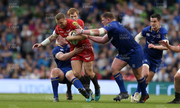 260518 - Leinster v Scarlets - Guinness PRO14 Final - Hadleigh Parkes of Scarlets is tackled by Dan Leavy of Leinster