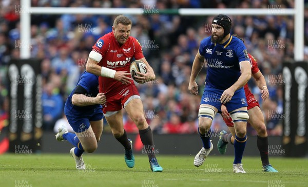 260518 - Leinster v Scarlets - Guinness PRO14 Final - Hadleigh Parkes of Scarlets is tackled by James Tracey of Leinster