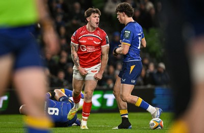 270326 - Leinster v Scarlets - United Rugby Championship - Joe Roberts of Scarlets celebrates after scoring his side's first try