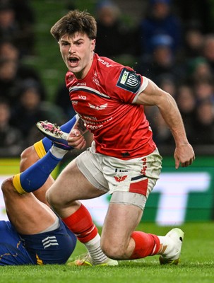 270326 - Leinster v Scarlets - United Rugby Championship - Joe Roberts of Scarlets celebrates after scoring his side's first try