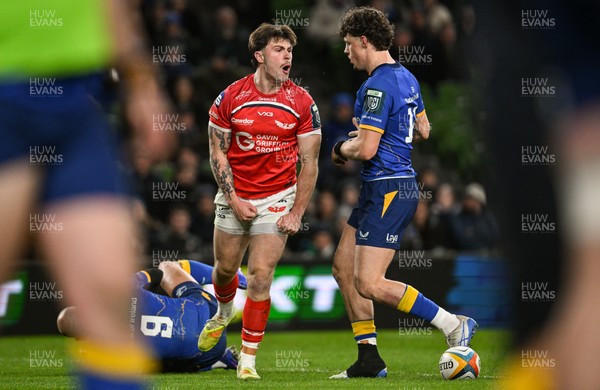 270326 - Leinster v Scarlets - United Rugby Championship - Joe Roberts of Scarlets celebrates after scoring his side's first try