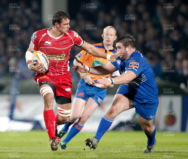 30/11/13 - Leinster v Scarlets - RaboDirect Pro 12Aaron Shingler of Scarlets is tackled by Martin Moore of Leinster (c) Huw Evans Picture Agency