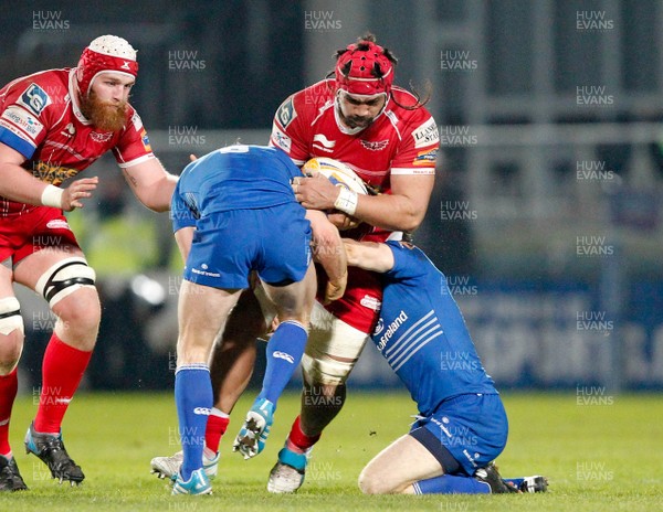 30/11/13 - Leinster v Scarlets - RaboDirect Pro 12Sione Timani of Scarlets is tackled by Eoin Reddan and Gordon D'Arcy of Leinster (c) Huw Evans Picture Agency