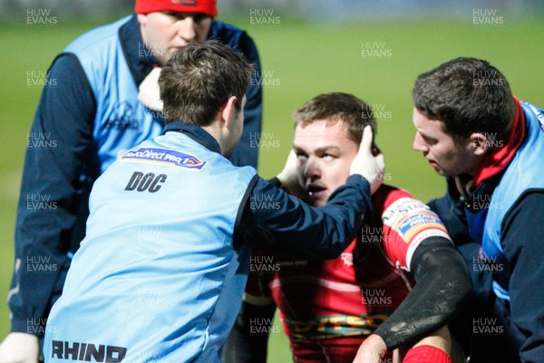 30/11/13 - Leinster v Scarlets - RaboDirect Pro 12Gareth Maule of  Scarlets receives attention (c) Huw Evans Picture Agency