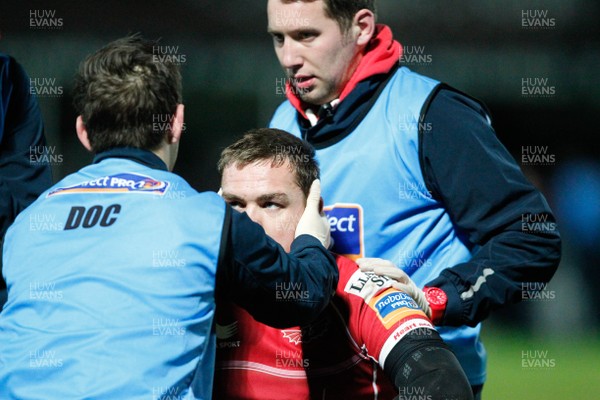 30/11/13 - Leinster v Scarlets - RaboDirect Pro 12Gareth Maule of  Scarlets receives attention (c) Huw Evans Picture Agency