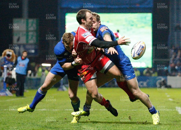 30/11/13 - Leinster v Scarlets - RaboDirect Pro 12Frazier Climo of Scarlets is tackled by Ian Madigan and Luke Fitzgerald of Leinster (c) Huw Evans Picture Agency