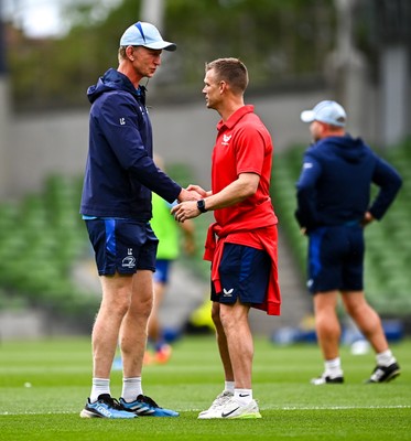 310525 - Leinster v Scarlets - United Rugby Championship Quarter-Final - Leinster head coach Leo Cullen, left, and Scarlets head coach Dwayne Peel