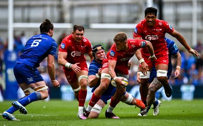 310525 - Leinster v Scarlets - United Rugby Championship Quarter-Final - Taine Plumtree of Scarlets in action against James Ryan of Leinster