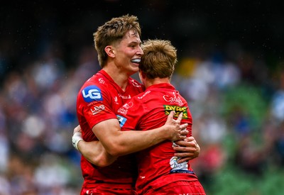 310525 - Leinster v Scarlets - United Rugby Championship Quarter-Final - Blair Murray of Scarlets, right, celebrates with teammate Ellis Mee after scoring their side's second try 