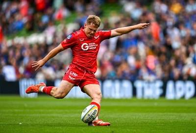 310525 - Leinster v Scarlets - United Rugby Championship Quarter-Final - Sam Costelow of Scarlets kicks the conversion