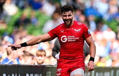 310525 - Leinster v Scarlets - United Rugby Championship Quarter-Final - Johnny Williams of Scarlets celebrates after scoring his side's third try