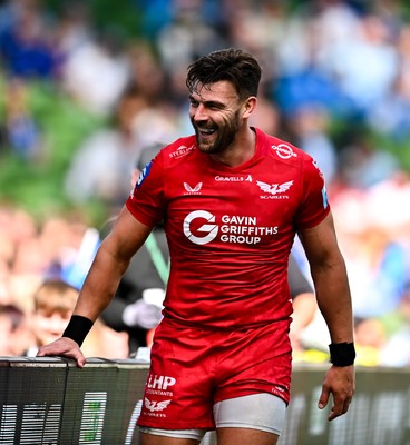 310525 - Leinster v Scarlets - United Rugby Championship Quarter-Final - Johnny Williams of Scarlets celebrates after scoring his side's third try