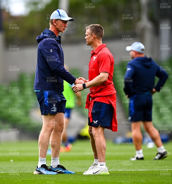 310525 - Leinster v Scarlets - United Rugby Championship Quarter-Final - Leinster head coach Leo Cullen, left, and Scarlets head coach Dwayne Peel