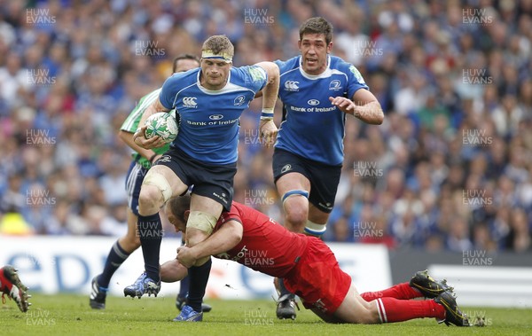 30.04.11 - Leinster v Toulouse - Heineken Cup Semi-Final Leinster's Jamie Heaslip is tackled by Toulouse's William Servat 