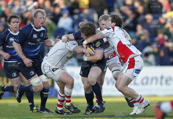 13.05.11 - Leinster v Ulster - Magners League Play-off Jason Harris-Wright of Leinster is tackled by Tom Court and Darren Cave of Ulster 