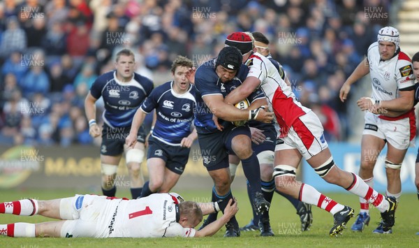 13.05.11 - Leinster v Ulster - Magners League Play-off Stan Wright of Leinster is tackled by Tom Court and Johann Muller of Ulster 