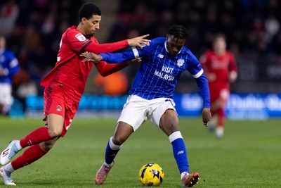 100126 - Leyton Orient v Cardiff City - Sky Bet League 1 - Ronan Kpakio of Cardiff City is challenged by Azeem Abdulai of Leyton Orient