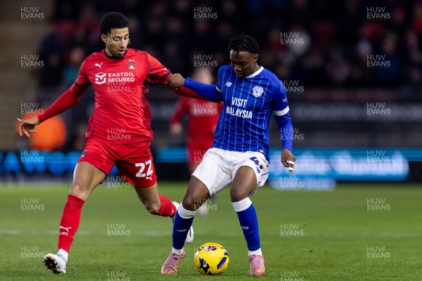 100126 - Leyton Orient v Cardiff City - Sky Bet League 1 - Ronan Kpakio of Cardiff City is challenged by Azeem Abdulai of Leyton Orient